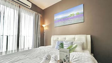 Deluxe Apartment, 2 Bedrooms, Balcony, Sea View | Iron/ironing board, free WiFi