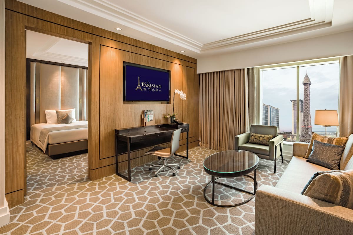 Lyon Premier Suite Double with Eiffel Tower View | Living area | 55-inch TV with cable channels