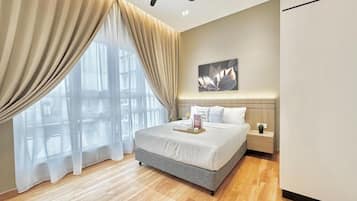 Apartemen, 3 kamar tidur, balkon, pemandangan kota | Tirai kedap cahaya, setrika/meja setrika, dan Wi-Fi gratis