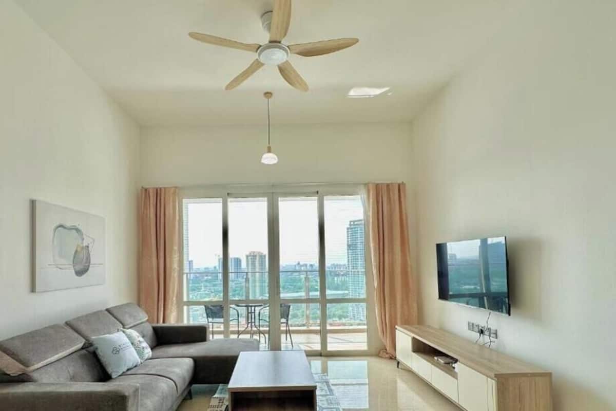 Comfort Apartment, 3 Bedrooms, Balcony, City View | Living area | Flat-screen TV