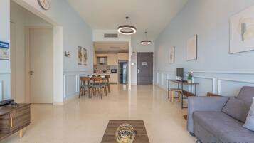 Classic Apartment, 2 Bedrooms, City View | Living area | Flat-screen TV