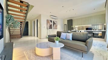 Executive maisonnette, 3 slaapkamers, uitzicht op de stad | Woonruimte