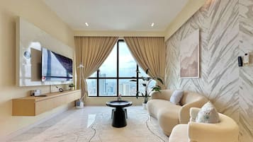 Deluxe appartement, 3 slaapkamers, uitzicht op de stad | Woonruimte