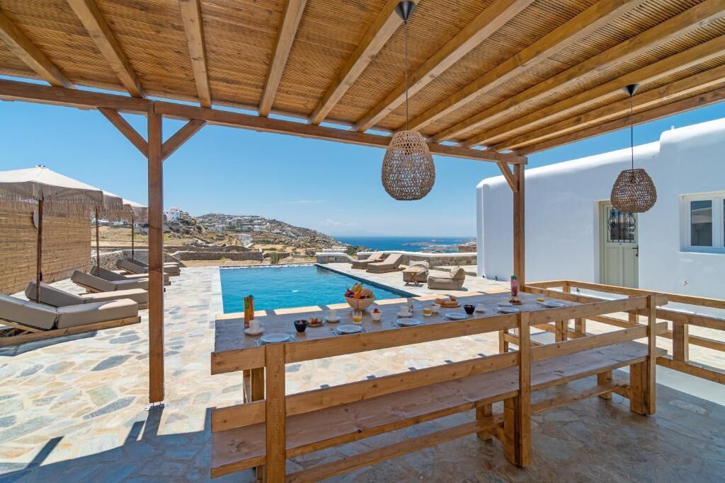 Deluxe-Villa, Terrasse, Poolblick | Speisen im Freien