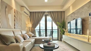 Comfort Apartment, 3 Bedrooms, Sea View | Living area | Flat-screen TV