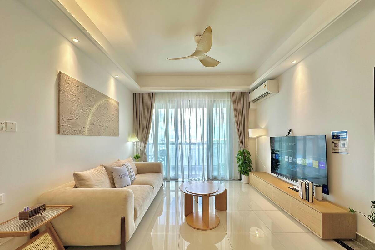 Deluxe Apartment, 3 Bedrooms, Sea View | Living area | Flat-screen TV