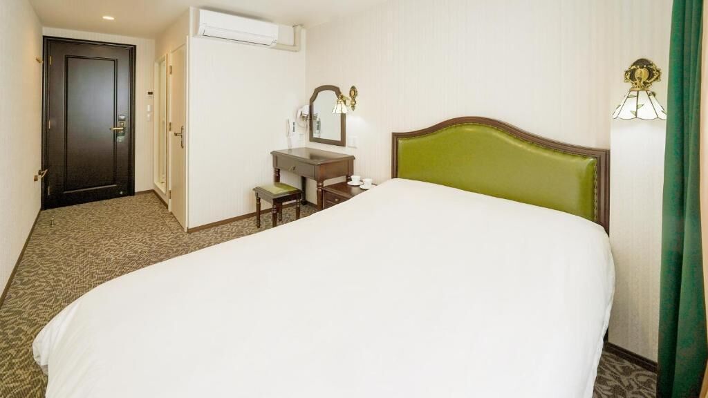 Double Room, City View | Blackout drapes, soundproofing, free WiFi