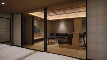 A hotel room with a wooden ceiling, a sofa, a small table, and a bed.