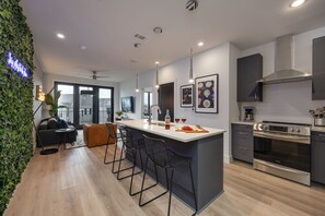 Fridge, stovetop, dishwasher, coffee/tea maker - Sleek Design + Pool + Gym Access | Near The Gulch + Midtown | Stay 514 (Nashville)