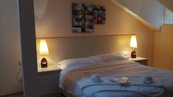 Standard Triple Room, City View | Desk, laptop workspace, free WiFi