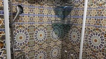 Shower, free toiletries, hair dryer, slippers