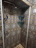 Shower, free toiletries, hair dryer, slippers