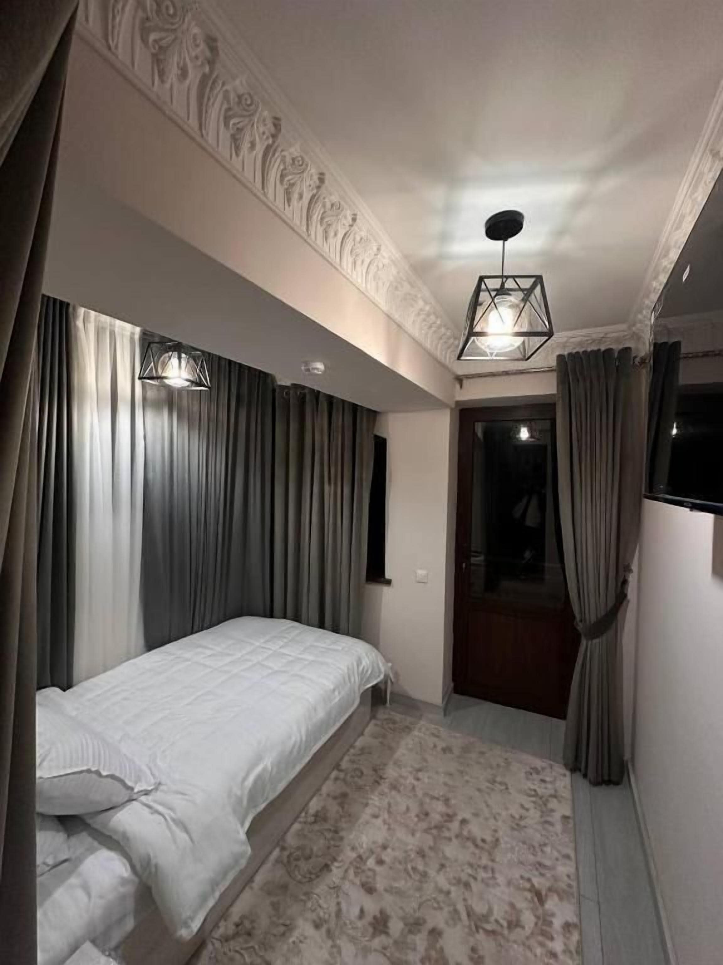 Standard Single Room, City View | Blackout drapes, soundproofing, iron/ironing board, free WiFi