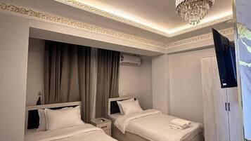 Standard Twin Room, City View | Blackout curtains, soundproofing, iron/ironing board, free WiFi