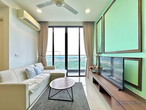 Deluxe Apartment, 1 King Bed, Balcony, City View | Living area | Flat-screen TV - D'Pristine Medini by Stayrene (Iskandar Puteri)