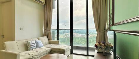 Deluxe Apartment, 1 King Bed, Balcony, City View | Living area