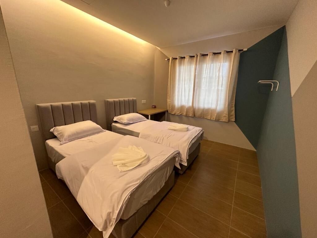 Two-Bedroom Suite | Desk, iron/ironing board, free WiFi