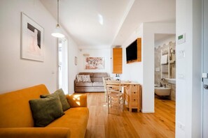 Suite familiare, vista città | Area soggiorno