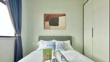 Blackout curtains, iron/ironing board, free WiFi