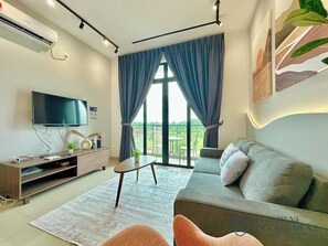 Apartment, 3 Bedrooms, Balcony, Garden View | Living area | Flat-screen TV - Desaru Utama Residence by Stayrene (Bandar Penawar)