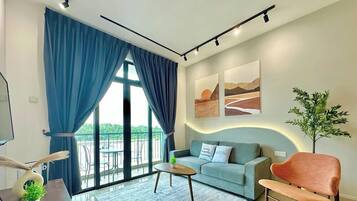 Departamento, 3 habitaciones, balcón, vista al jardín | Área de sala de estar