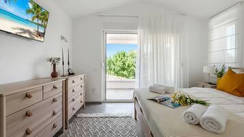 Vila família, vários quartos (Villa Ora) | 3 quartos, ferros/tábuas de passar roupa, Wi-Fi de cortesia