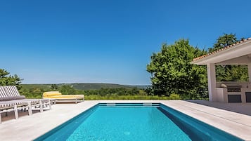 Seasonal outdoor pool, a heated pool