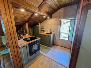 Apartamento, vista para o jardim | Cozinha privada