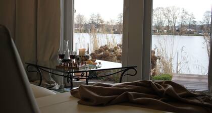 WasserWerk apartment - directly on the water, terrace, island view, jetty, sauna, wood-burning stove