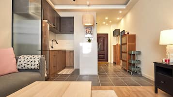 Superior Suite, City View | Living area