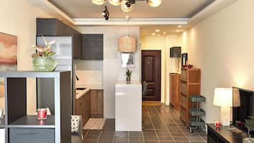 Superior Suite, City View | Living area