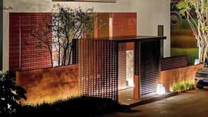 A modern two-story building with large windows and a brick facade. - GuanLu Art hotel (Guangzhou)