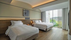 A modern hotel room with two beds, a large window with curtains, and a view of the outdoors. - GuanLu Art hotel (Guangzhou)