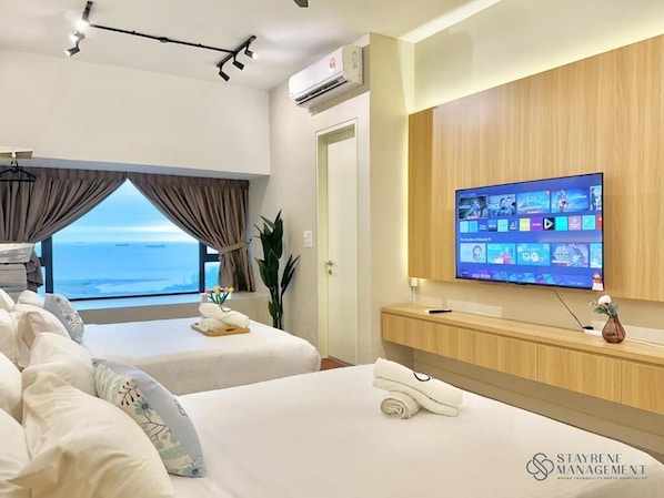 Estudio superior, 2 camas Queen size, vista al mar | Tabla de planchar con plancha y wifi gratis 