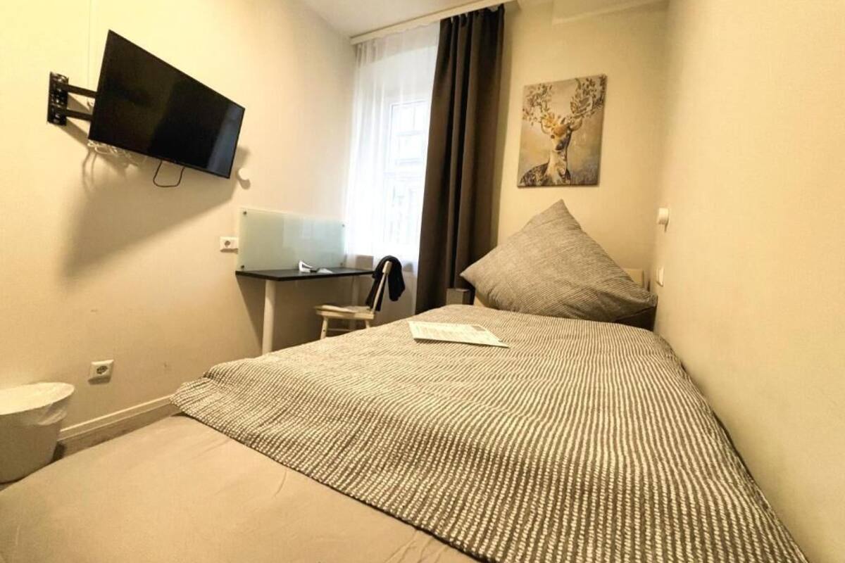 Economy Single Room | Blackout drapes, soundproofing, free WiFi