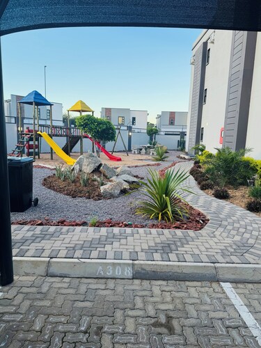 2-bedroom apartment in Sarona just by the mall equiped with pool BBQ gated suite