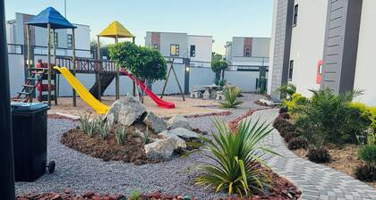 2-bedroom apartment in Sarona just by the mall equiped with pool BBQ gated suite