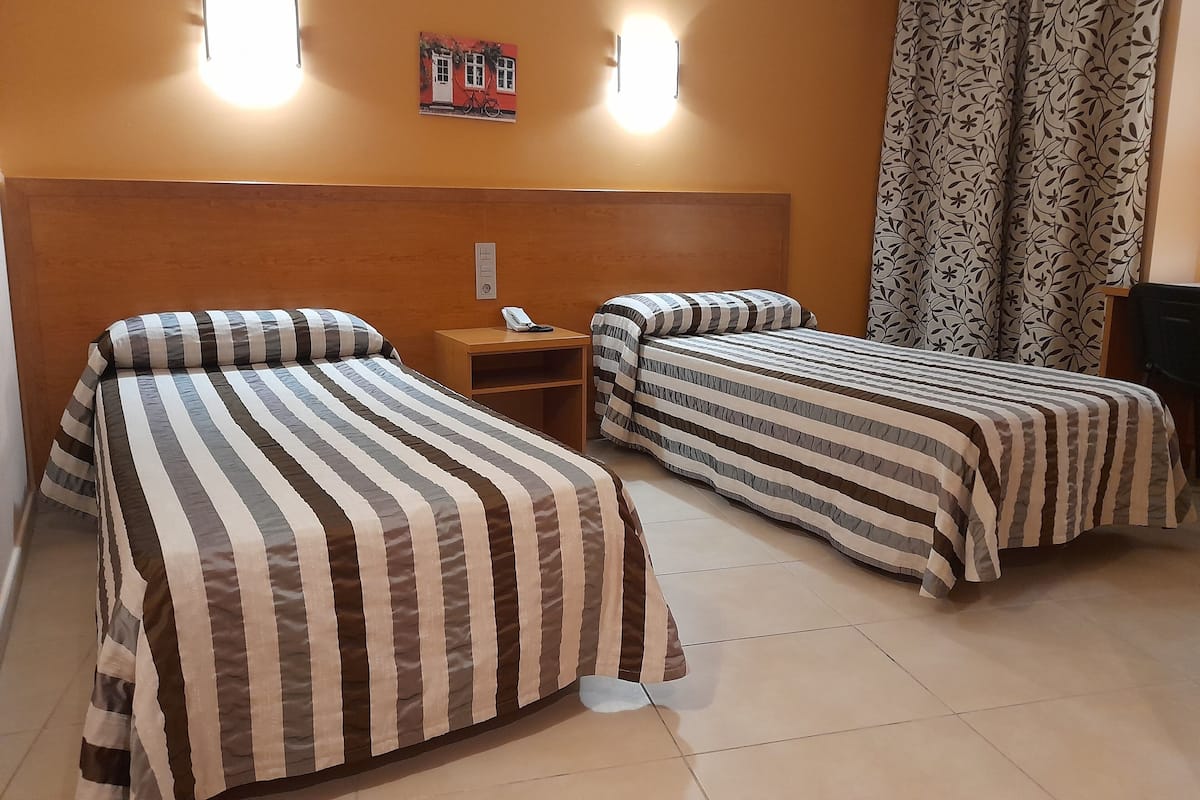 Comfort Twin Room, City View | Desk, laptop workspace, free WiFi