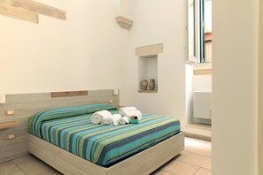 1 dormitorio, tabla de planchar con plancha, wifi gratis y ropa de cama