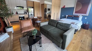 Unclassified image, 3 of 17, button - Modern loft on Monterrey Street in the heart of Roma Norte. Perfect for up to 3 guests, with a fully equipped kitchen, sofa bed, fast WiFi ideal for remote work, and easy self check-in. Shared rooftop and laundry in the building. Walk to cafés, parks (Cuauhtémoc)