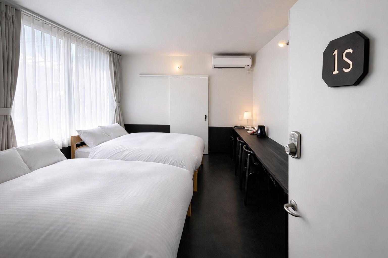 Twin Room, City View | Laptop workspace, blackout curtains, iron/ironing board, free WiFi