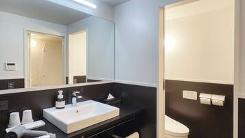 Twin Room, Garden View | Bathroom | Separate tub and shower, hair dryer, slippers, towels