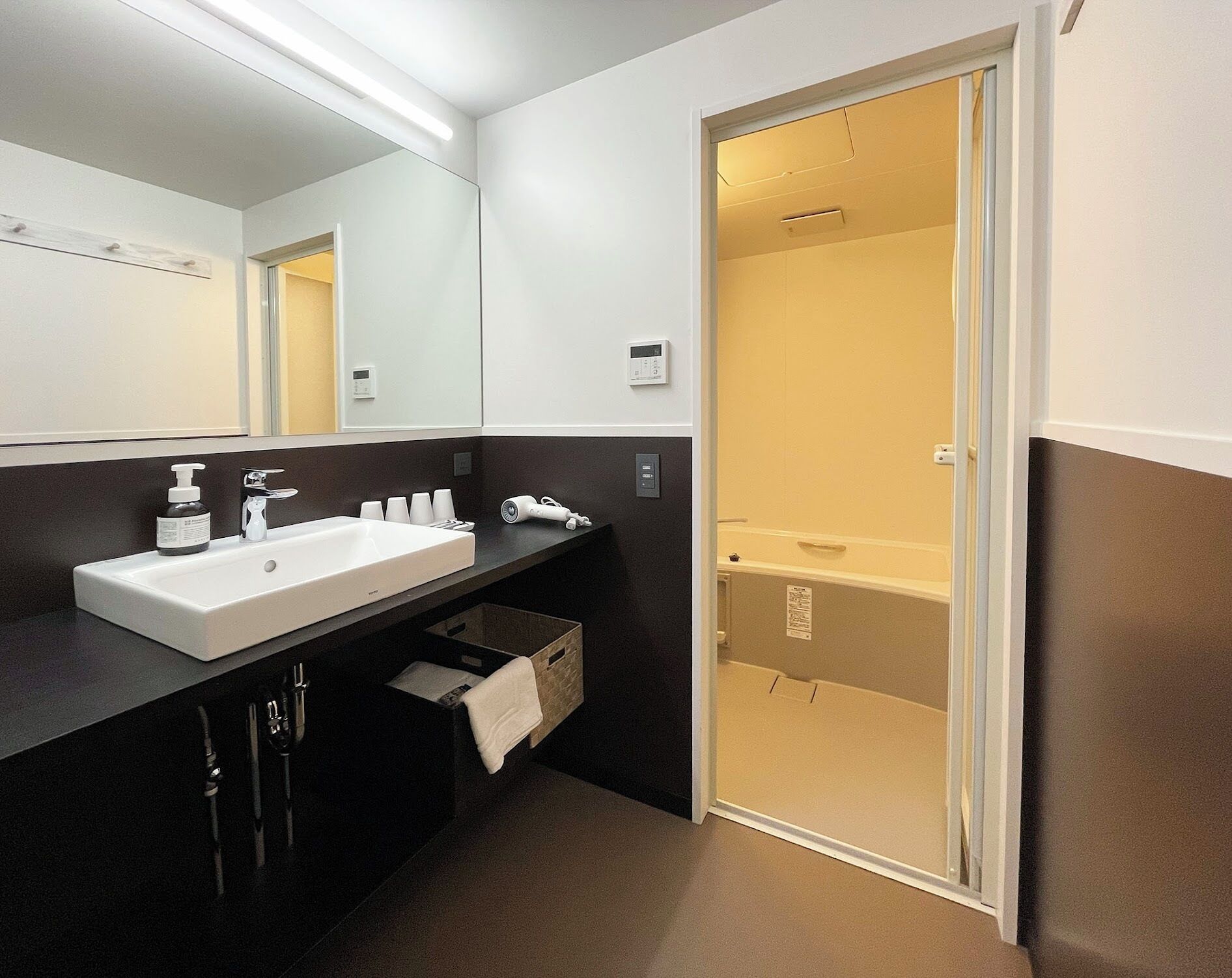 Room | Bathroom | Separate bathtub and shower, hair dryer, slippers, towels