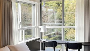 Twin Room, Garden View | Laptop workspace, blackout drapes, iron/ironing board, free WiFi