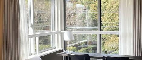 Twin Room, Garden View | Laptop workspace, blackout drapes, iron/ironing board, free WiFi