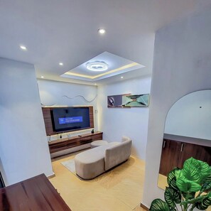 Family Apartment, Balcony, City View | Living area - Omo-One Apartment (Benin City)