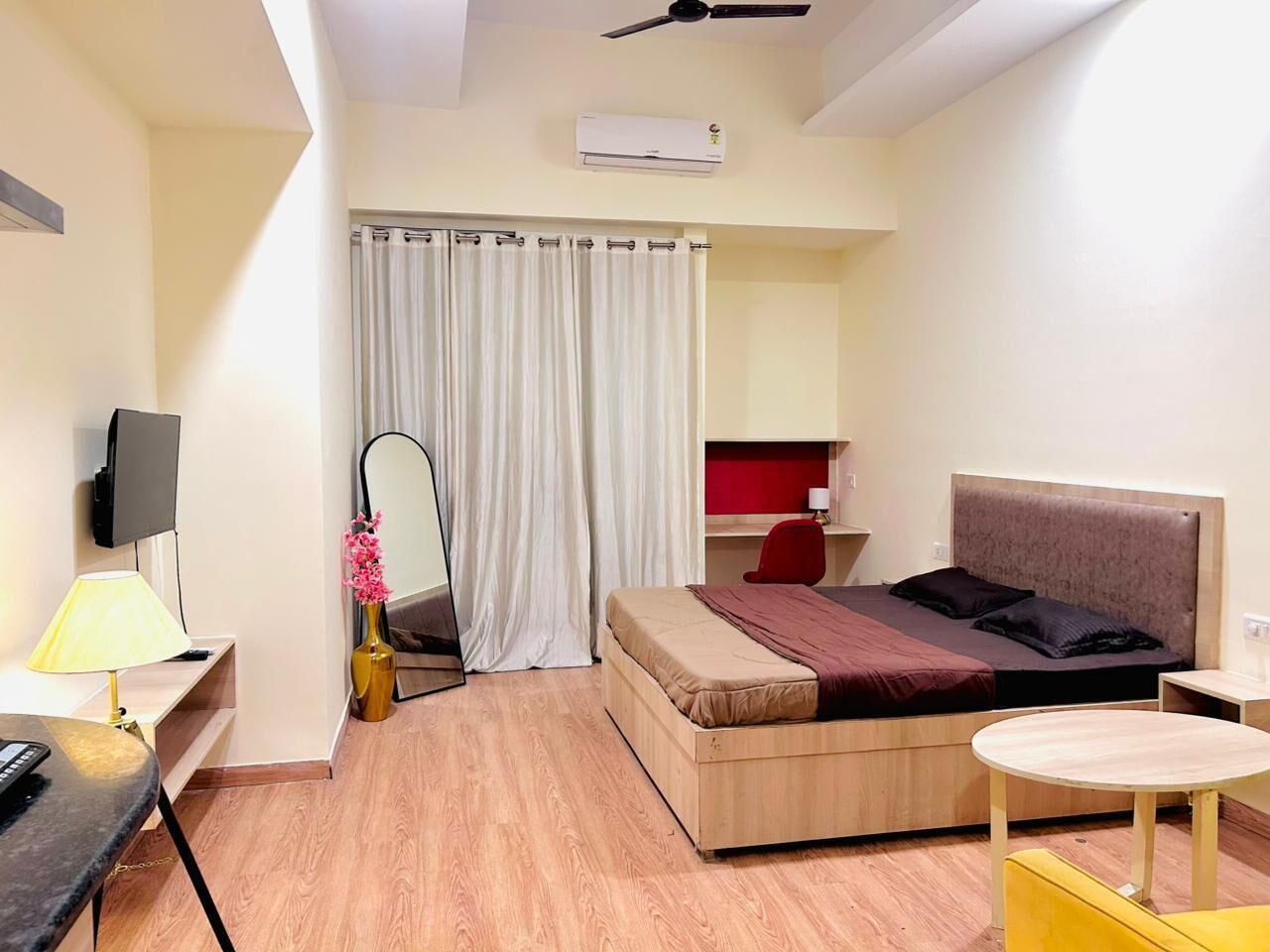 Desk, laptop workspace, blackout curtains, iron/ironing board