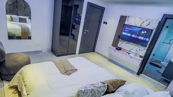 Economy Room, Balcony, City View | Desk, laptop workspace, blackout drapes, soundproofing