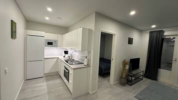 Apartment | Private kitchen | Full-sized fridge, microwave, oven, stovetop