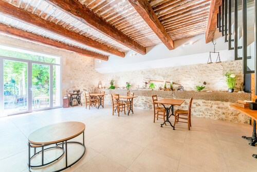 Chambre 'Monique' avec terrasse partagée, jardin privé et climatisation